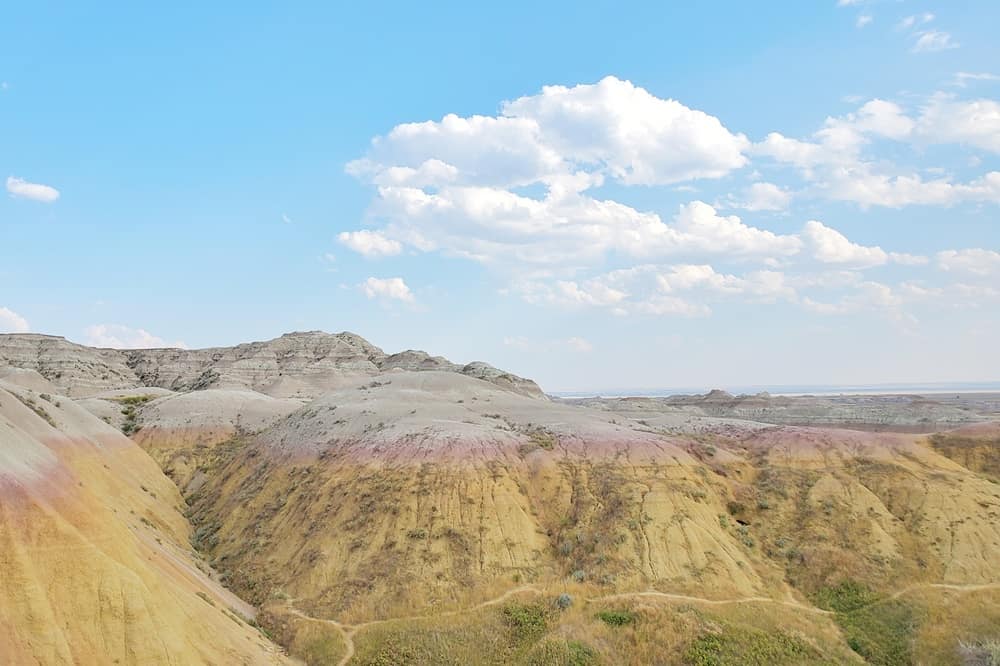Hiking from Yellow Mounds Overlook. yellow mounds trail. Badlands National Park. sd travel blog