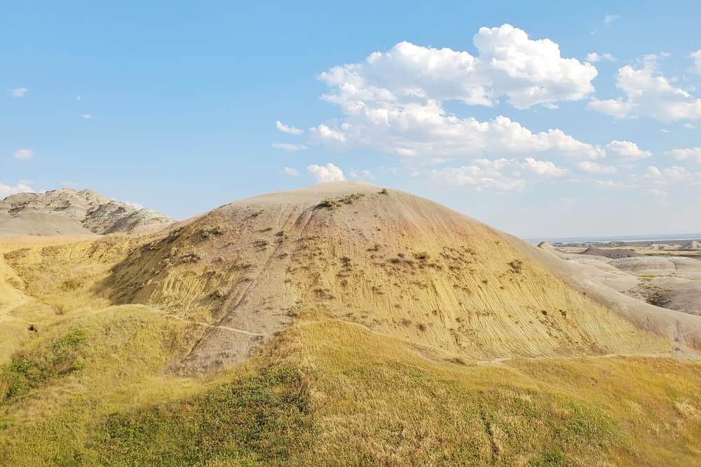 Yellow Mounds overlook: scenic views of yellow badlands in badlands national park. south dakota travel blog