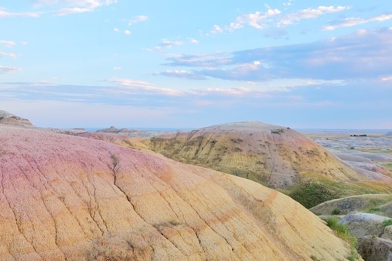 Yellow Mounds overlook: scenic views of yellow badlands in badlands national park. south dakota travel blog