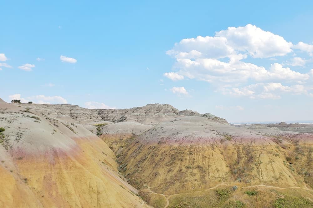 Where to see yellow badlands in South Dakota: Yellow Mounds Overlook scenic viewpoint in Badlands National Park. sd travel blog