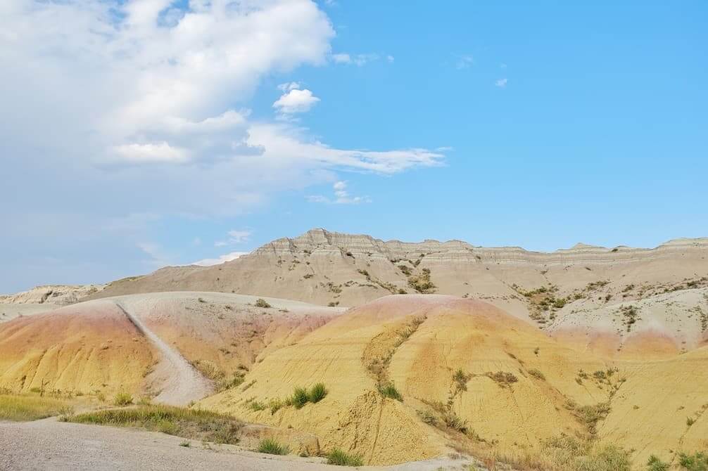 Where to see yellow badlands in South Dakota: Yellow Mounds Overlook scenic viewpoint in Badlands National Park. sd travel blog