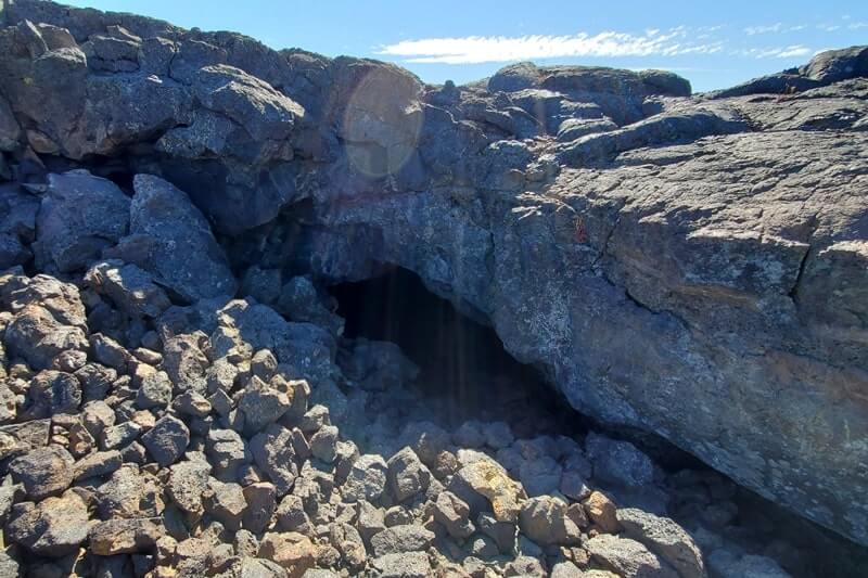 Beauty Cave: Where to see a lava tube in Idaho. Craters of the moon lava tube. Craters of the moon caves in Idaho. idaho travel blog