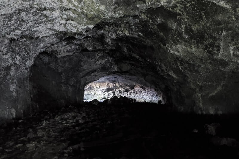Inside Beauty Cave: Where to see a lava tube in Idaho. Craters of the moon lava tube. Craters of the moon caves in Idaho. idaho travel blog