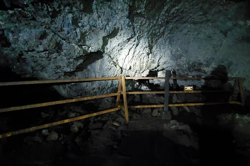 walking through beauty cave lava tube. craters of the moon. idaho travel blog