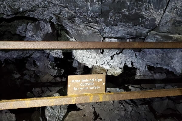 walking through beauty cave lava tube. craters of the moon. idaho travel blog