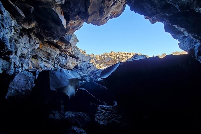 Getting to Beauty Cave: Caves Trail to Dewdrop Cave to Beauty Cave. craters of the moon. idaho travel blog