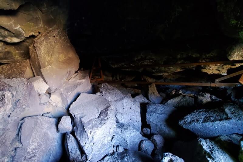 going into boy scout cave lava tube. craters of the moon. idaho travel blog