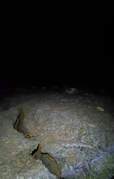 walking through boy scout cave lava tube. craters of the moon. idaho travel blog