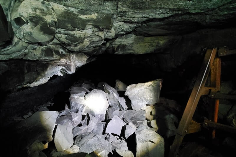 walking through boy scout cave lava tube. craters of the moon. idaho travel blog