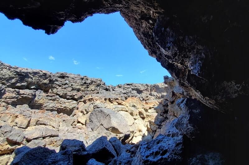 boy scout cave opening. lava tube in craters of the moon. idaho travel blog