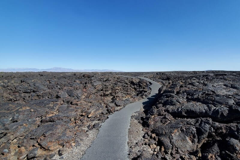Getting to Boy Scout Cave: Caves Trail to Boy Scout Cave through craters of the moon lava fields. idaho travel blog