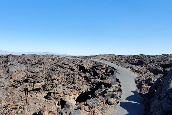 Getting to Boy Scout Cave: Caves Trail to Boy Scout Cave through craters of the moon lava fields. idaho travel blog