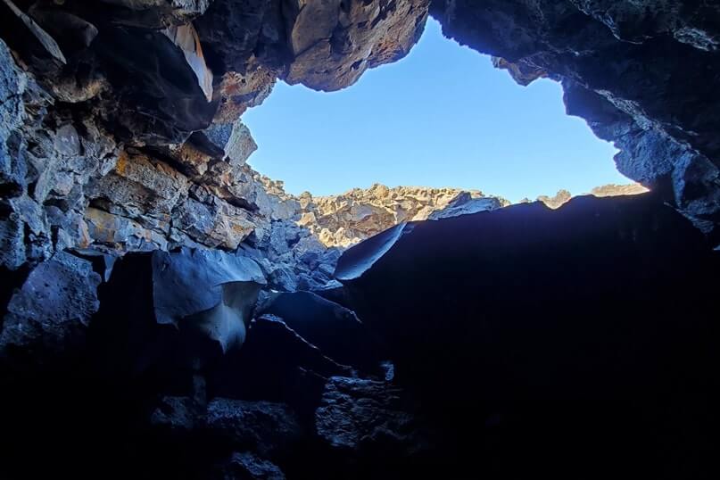Getting to Boy Scout Cave: Caves Trail to Dewdrop Cave to Boy Scout Cave. craters of the moon. idaho travel blog