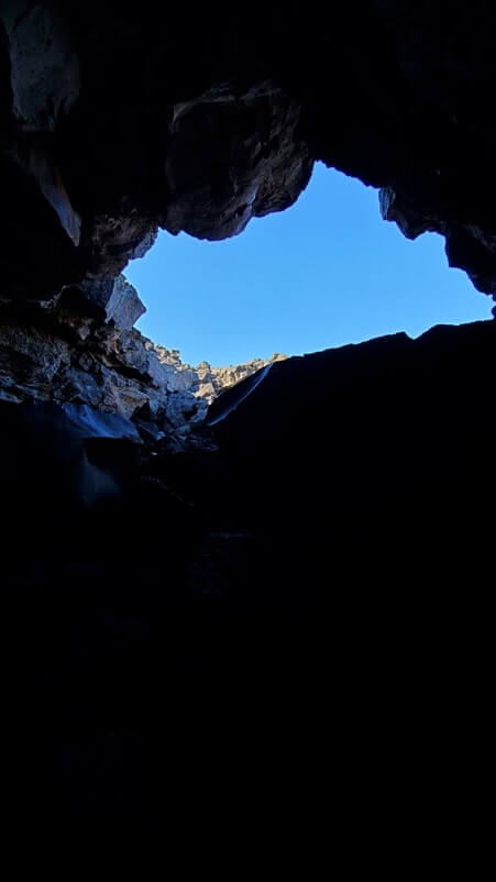 Dewdrop Cave: Where to see a lava tube in Idaho. Craters of the moon lava tube. Craters of the moon caves in Idaho. idaho travel blog