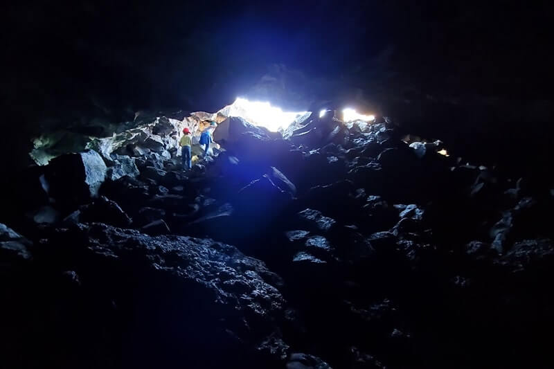 Dewdrop Cave: Where to see a lava tube in Idaho. Craters of the moon lava tube. Craters of the moon caves in Idaho. idaho travel blog