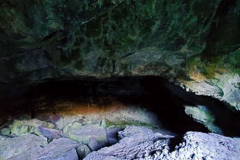 going into Dewdrop Cave. craters of the moon. idaho travel blog