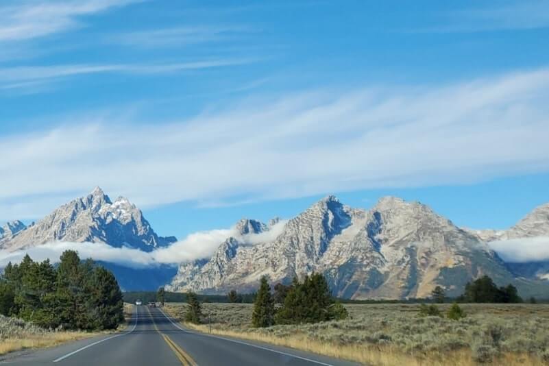 Driving the 42-mile scenic loop road in Grand Teton National Park: Driving through Grand Teton National Park from jackson lake dam to signal mountain road to potholes turnout, north to south. wyoming travel blog