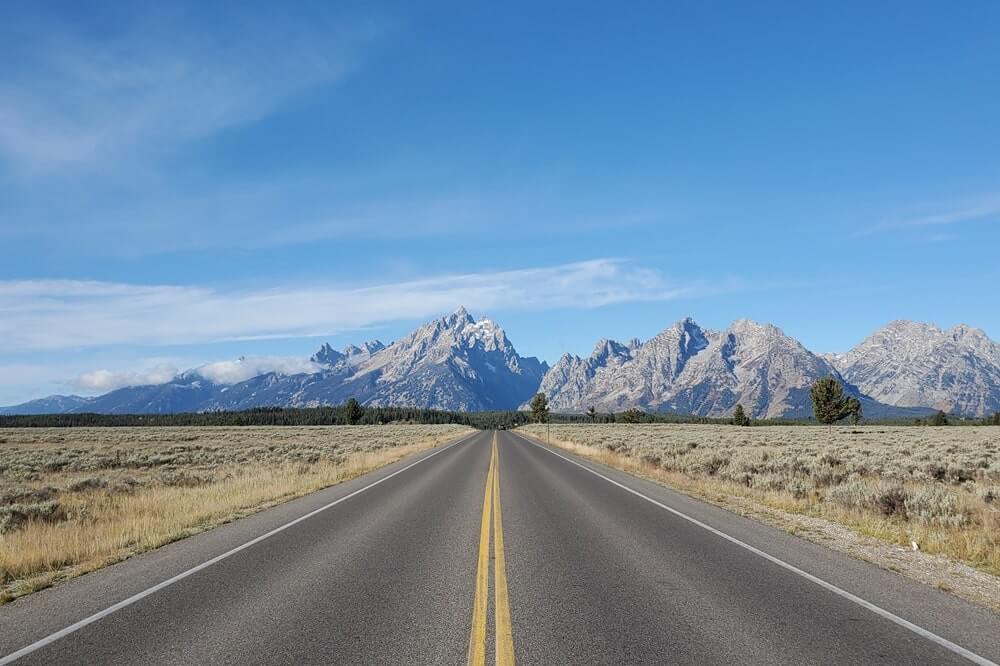 Driving the 42-mile scenic loop road in Grand Teton National Park: Driving through Grand Teton National Park from potholes to mount moran turnout, north to south. wyoming travel blog