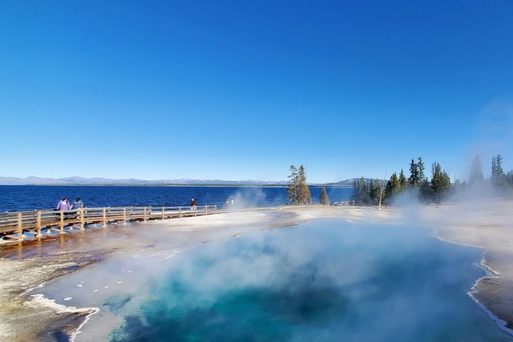 Driving from Grand Teton to Yellowstone National Park: Driving through Yellowstone National Park. wyoming national parks road trip. wyoming travel blog