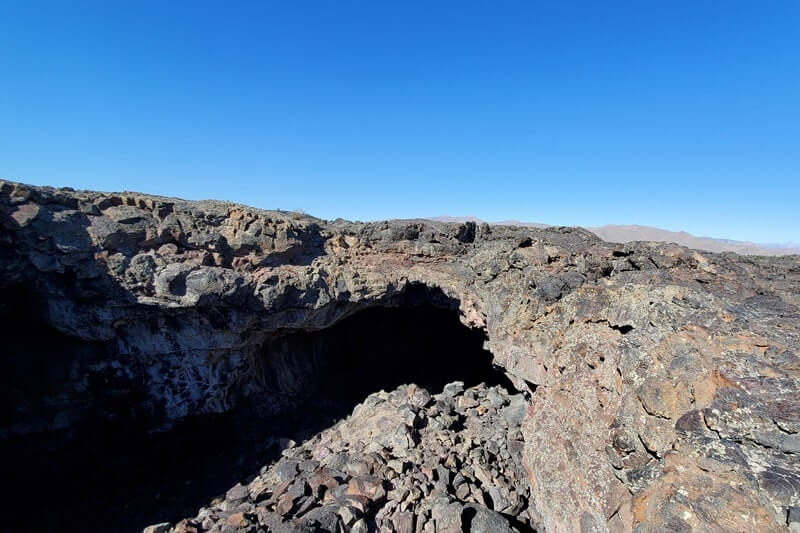 Getting to Indian Tunnel cave entrance. Craters of the moon tunnel in Idaho. idaho travel blog