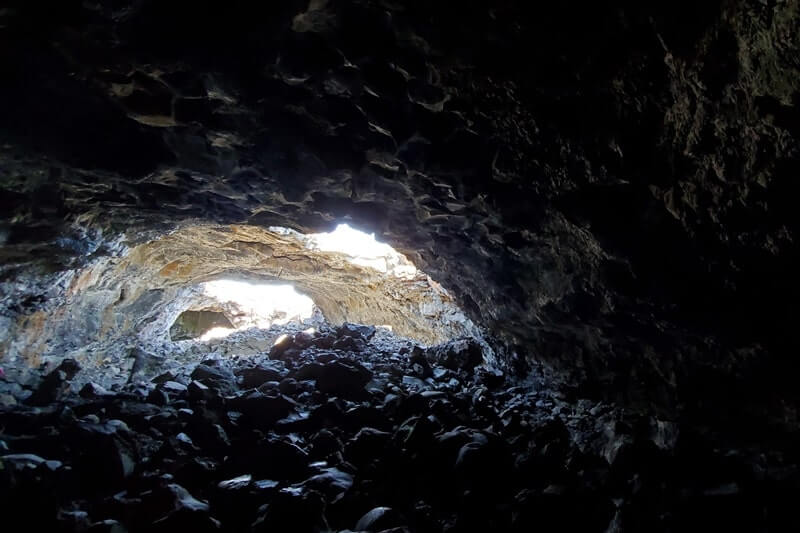 What to bring for hiking the Indian Tunnel. craters of the moon cave tunnel. idaho travel blog