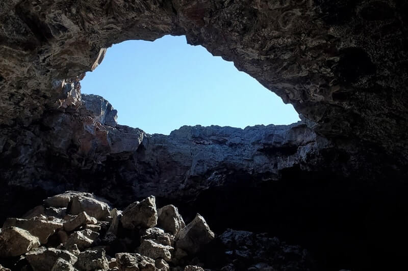 What to bring for hiking the Indian Tunnel. craters of the moon cave tunnel. idaho travel blog