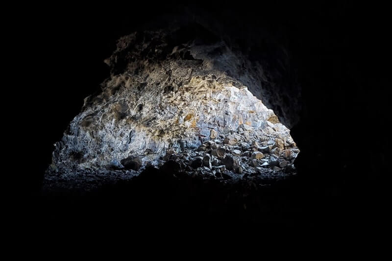 What to bring for hiking the Indian Tunnel. craters of the moon cave tunnel. idaho travel blog