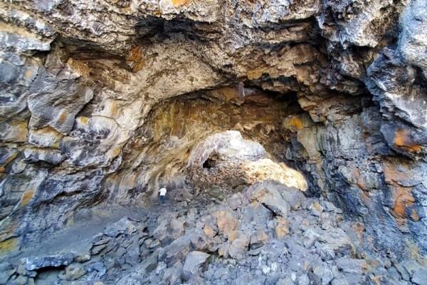 walking through indian tunnel lava tube. craters of the moon tunnel. idaho travel blog