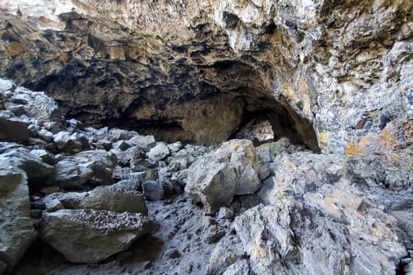 walking through indian tunnel lava tube. craters of the moon tunnel. idaho travel blog