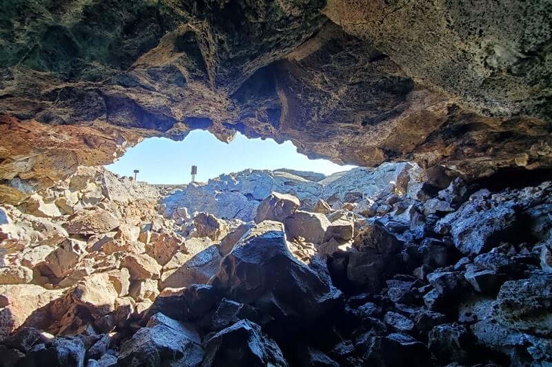 Getting to Indian Tunnel: Caves Trail to Dewdrop Cave to Indian Tunnel. craters of the moon. idaho travel blog