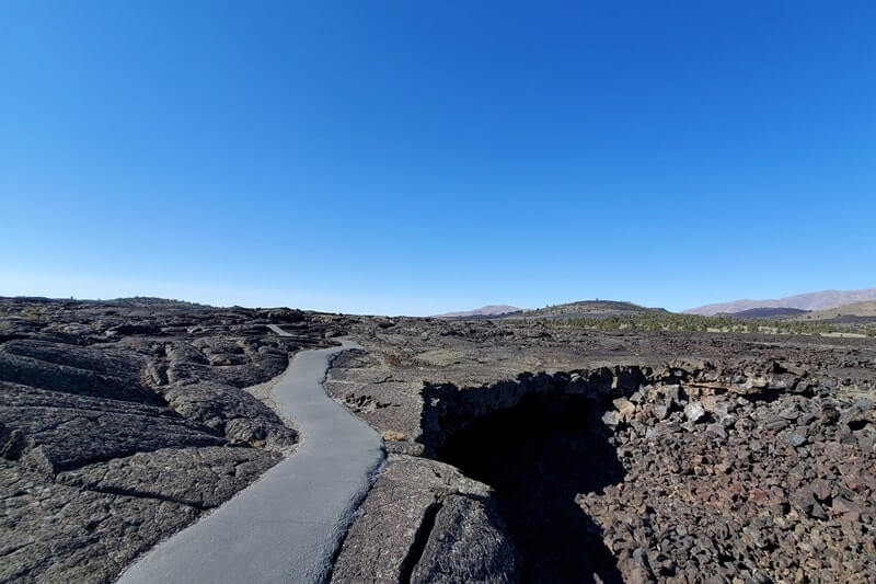 Caves Trail to Indian Tunnel. Lava fields, Craters of the moon tunnel in Idaho. idaho travel blog