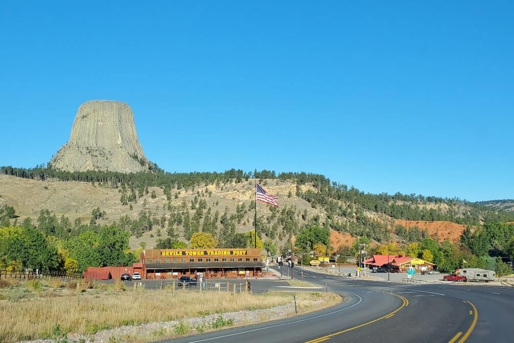 Driving from Mount Rushmore to Devils Tower: Driving through Devils Tower National Monument in Wyoming. South Dakota to Wyoming road trip.