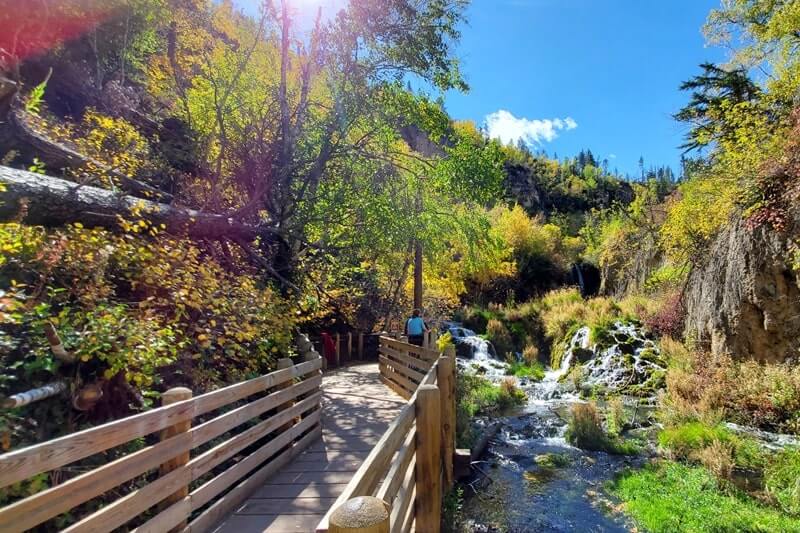 Stops to make when driving from Mount Rushmore to Roughlock Falls to Devils Tower: hiking the roughlock falls trail. south dakota to wyoming