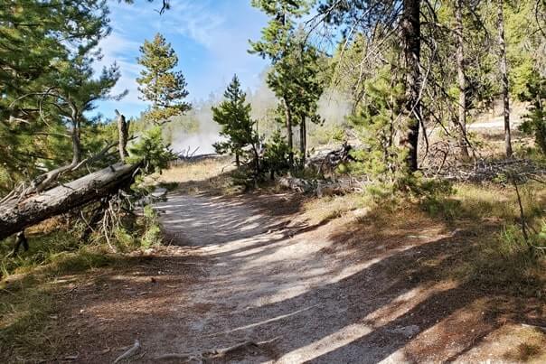 Solitary geyser trail. Hiking to Solitary Geyser: observation point trail to solitary geyser trail. yellowstone geyser hiking. wyoming travel blog