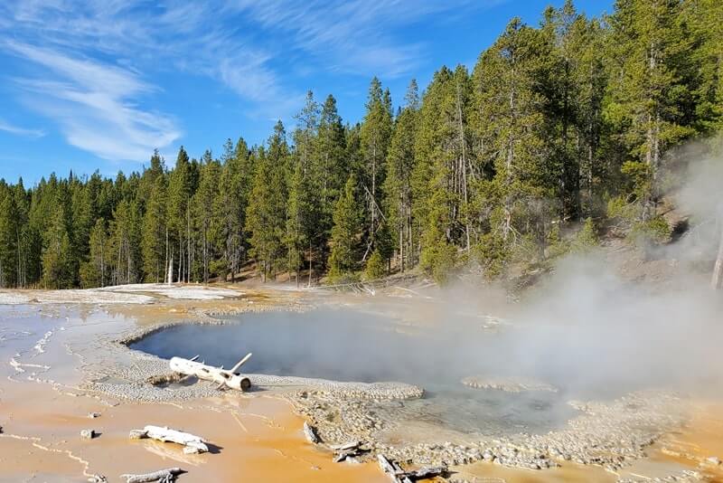 Solitary Geyser weather in yellowstone. yellowstone steam. wyoming travel blog