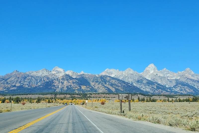 driving the teton park road to cascade canyon turnout. grand teton scenic loop drive. wyoming travel blog