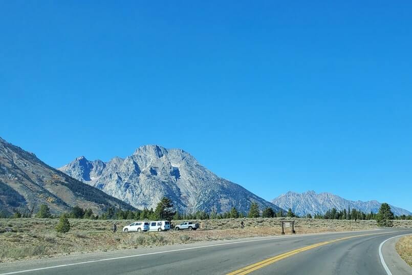 Driving the Teton Park Road to cascade canyon turnout parking. grand teton scenic loop drive. wyoming travel blog