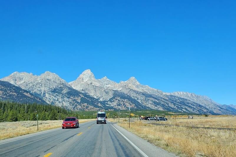 driving the teton park road to teton glacier turnout. grand teton scenic loop drive. wyoming travel blog