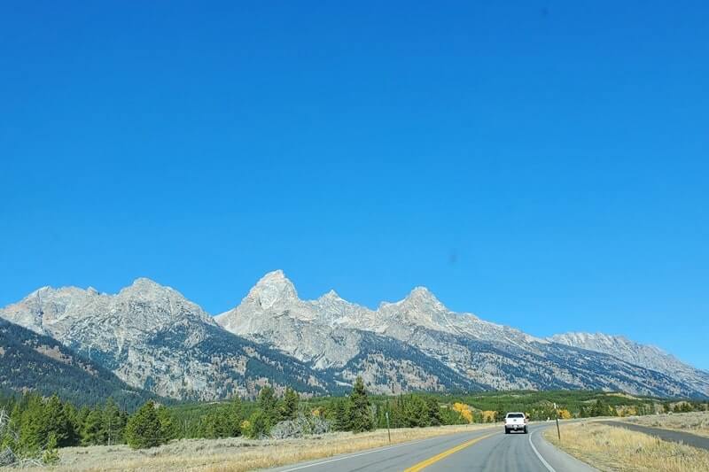driving the teton park road to teton glacier turnout. grand teton scenic loop drive. wyoming travel blog