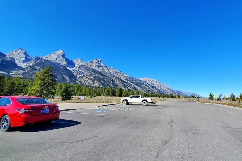 driving to Teton Glacier turnout parking on teton park road in grand teton national park. grand teton scenic loop drive. wyoming travel blog