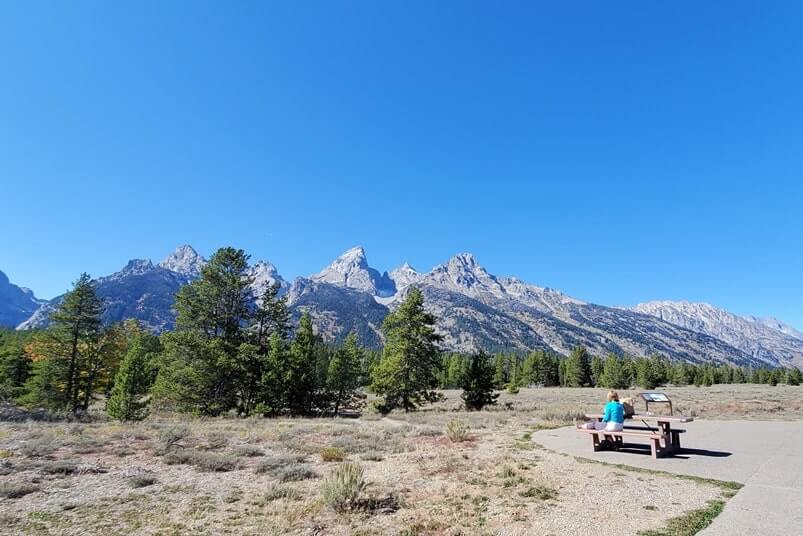 driving the teton park road to teton glacier picnic area. grand teton scenic loop drive. wyoming travel bra