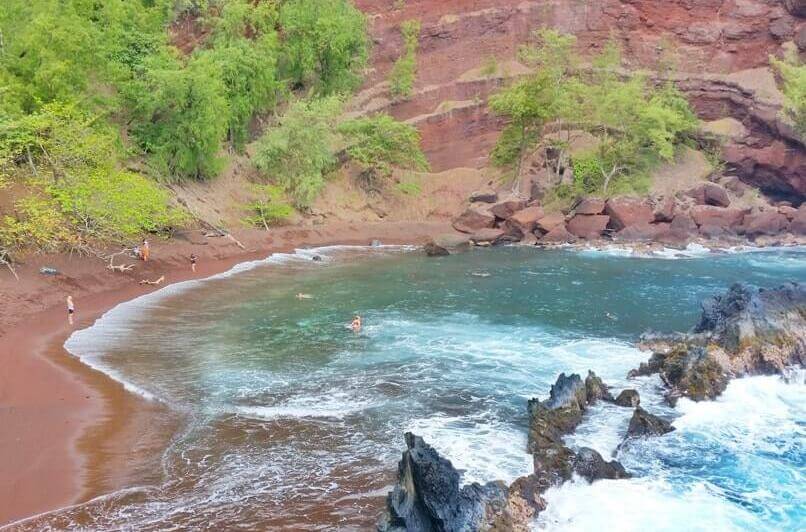 Things to do in Hana: hana red sand beach. kaihalulu beach. maui hawaii travel blog