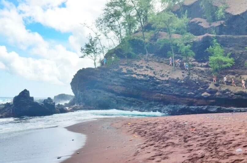 Things to do in Hana: hana red sand beach. kaihalulu beach. maui hawaii travel blog