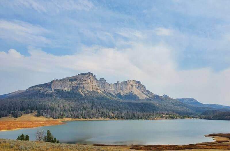 driving route from badlands national park to Grand Teton National Park road trip drive. Stop at brooks lake. badlands national park to shoshone national forest to grand teton national park.