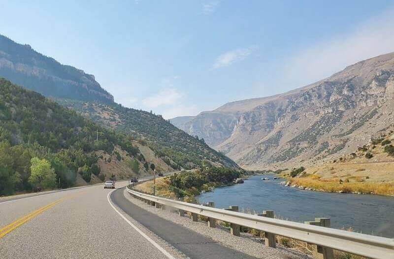 driving route from badlands national park to Grand Teton National Park road trip drive. badlands national park to wind river canyon scenic byway to grand teton national park.