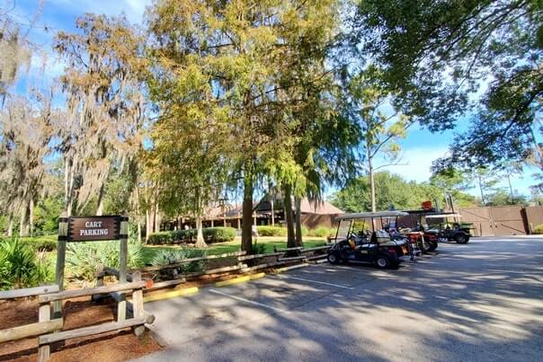 meadow trading post golf cart parking to buy ice at fort wilderness campground store. Disney World campground ice. florida travel blog