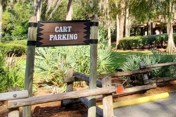 meadow trading post golf cart parking to buy ice at fort wilderness campground store. Disney World campground ice. florida travel blog