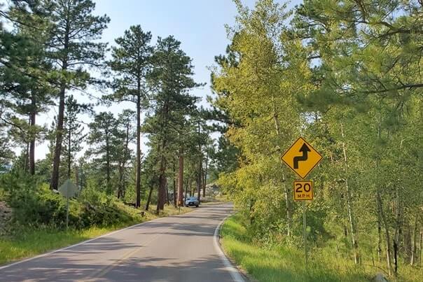Driving iron mountain road to cc gideon tunnel, black hills national forest. south dakota travel blog