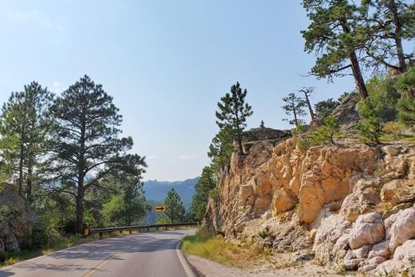 Driving iron mountain road to cc gideon tunnel, black hills national forest. south dakota travel blog