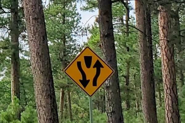 Driving iron mountain road to cc gideon tunnel, black hills national forest. south dakota travel blog